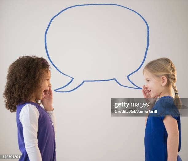 girls whispering with empty speech bubble - girl with no mouth stock pictures, royalty-free photos & images