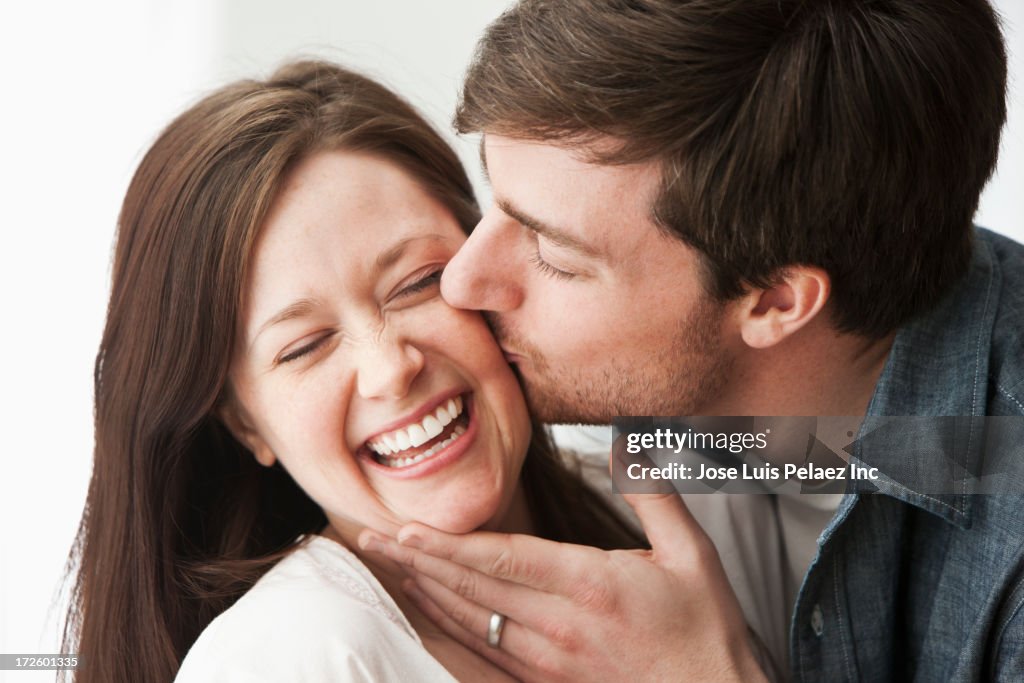 Caucasian couple kissing