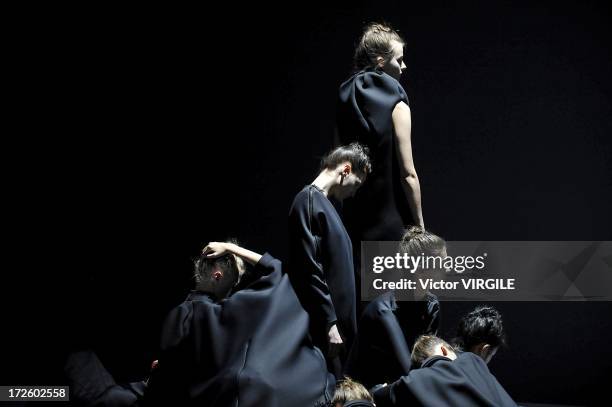 Model walks the runway during the Viktor&Rolf show as part of Paris Fashion Week Haute-Couture Fall/Winter 2013-2014 on July 3, 2013 in Paris, France.