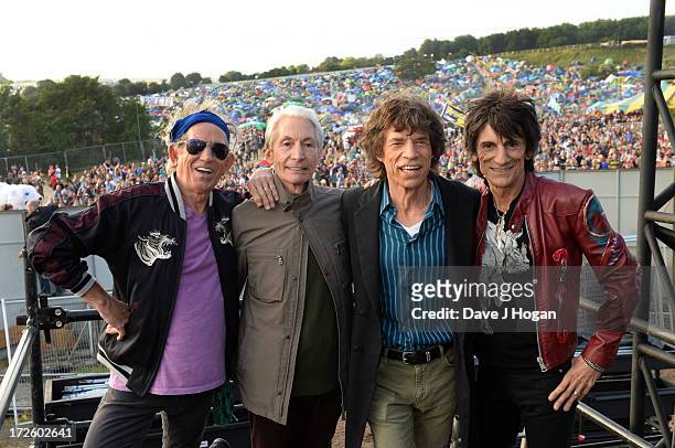 Keith Richards, Charlie watts, Mick Jagger and Ronnie Wood of The Rolling Stones pose backstage ahead of their headlining performance on day 3 of the...