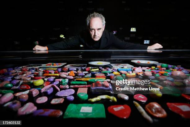 Cult Catalan chef Ferran Adria looks at plasticine models of his signature dishes, within the summer exhibition 'elBulli: Ferran Adria and The Art of...