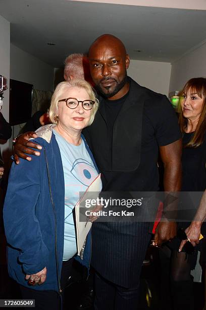 Josiane Balaskoand Jimmy Jean Louis attend the Jean Paul Gaultier show as part of Paris Fashion Week Haute-Couture Fall/Winter 2013-2014 at 325 Rue...