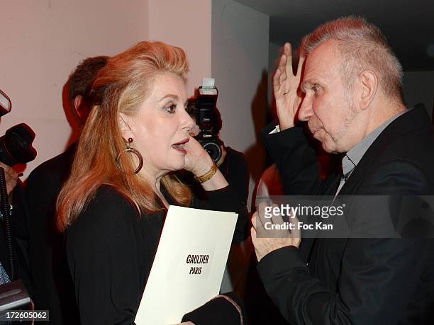 Catherine Deneuve and Jean Paul Gaultier attend the Jean Paul Gaultier show as part of Paris Fashion Week Haute-Couture Fall/Winter 2013-2014 at 325...