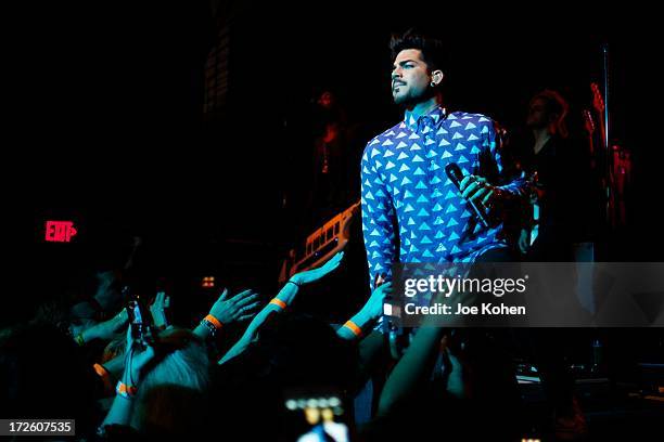 Singer Adam Lambert performs live at Playhouse Hollywood on July 3, 2013 in Los Angeles, California.