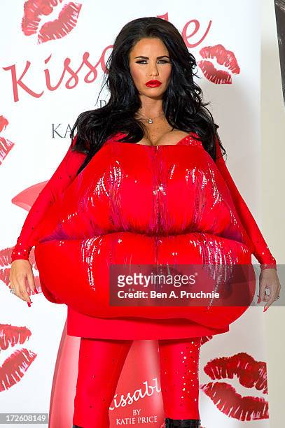 Katie Price attends a photocall to launch her new fragrance 'Kissable' at The Worx Studio's on July 4, 2013 in London, England.