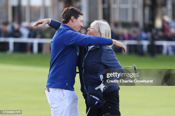 Matt Fitzpatrick of England embraces his Mother and playing partner, Susan Fitzpatrick on the 18th green during Round Three on Day Five of the Alfred...