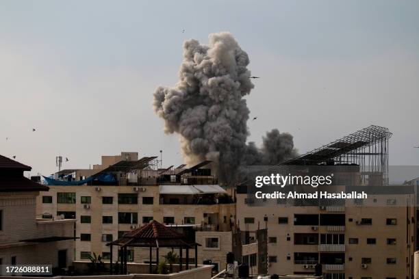 Smoke rises after an Israeli bombardment on October 9, 2023 in Gaza City, Gaza. Almost 500 people have died in Gaza after Israel launched sustained...