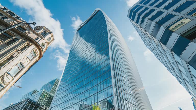 https://media.gettyimages.com/id/1726096055/video/skyscraper-in-london-financial-district-with-clouds-in-the-daytime.jpg?b=1&s=640x640&k=20&c=RBf6420D8xq3qvj5c3undVnLCyWgFrLCuV_qFsD3yy0=