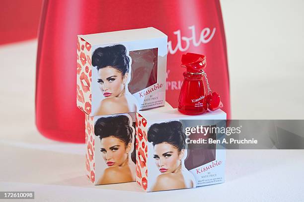 Katie Price attends a photocall to launch her new fragrance 'Kissable' at The Worx Studio's on July 4, 2013 in London, England.