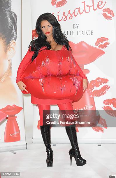 Katie Price attends a photocall to launch her new fragrance 'Kissable' at The Worx Studio's on July 4, 2013 in London, England.