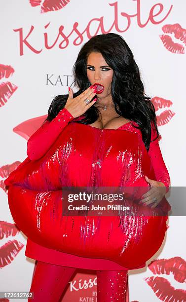 Katie Price attends a photocall to launch her new fragrance 'Kissable' at The Worx Studio's on July 4, 2013 in London, England.