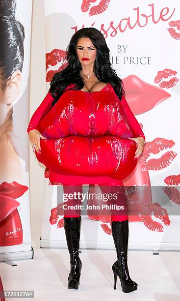 Katie Price attends a photocall to launch her new fragrance 'Kissable' at The Worx Studio's on July 4, 2013 in London, England.