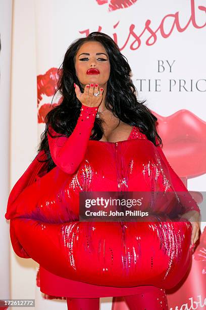 Katie Price attends a photocall to launch her new fragrance 'Kissable' at The Worx Studio's on July 4, 2013 in London, England.