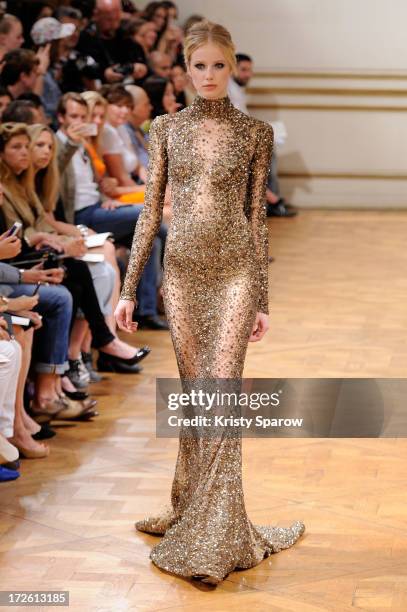 Model walks the runway during the Zuhair Murad show as part of Paris Fashion Week Haute-Couture Fall/Winter 2013-2014 at Hotel de Montmorency on July...