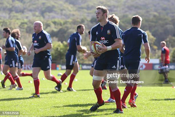 Dan Lydiate runs with the ball during a British and Irish Lions training session at Noosa Dolphins RFA on July 4, 2013 in Noosa, Australia.