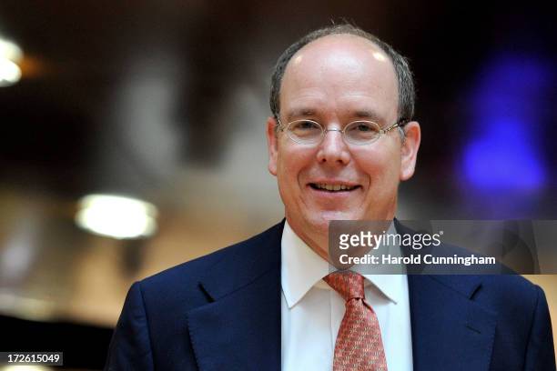 Committee Member Prince Albert II of Monaco enters the presentation room for the 3rd Summer Youth Olympic Games in 2018 bid on July 4, 2013 in...