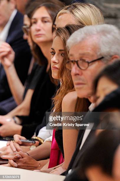 Kristen Stewart watches the Zuhair Murad show from the front row as part of Paris Fashion Week Haute-Couture Fall/Winter 2013-2014 at Hotel de...
