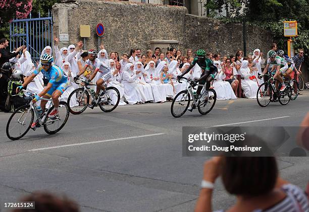 The breakaway passes a group of nuns during stage five of the 2013 Tour de France, a 228.5KM road stage from Cagnes-sur-mer to Marseille, on July 3,...