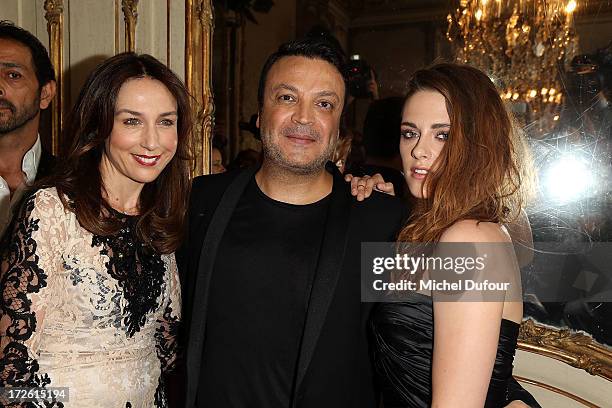 Elsa Zylberstein, Zuhair Murad and Kristen Stewart attend the Zuhair Murad show as part of Paris Fashion Week Haute-Couture Fall/Winter 2013-2014 at...