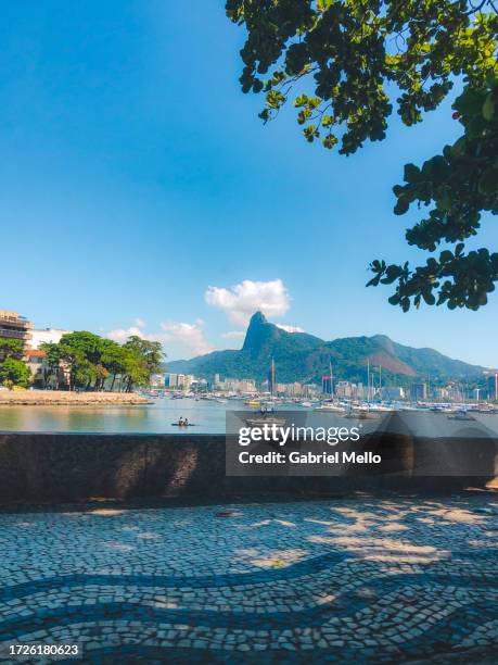 views of corcovado mountain from far distance - urca rio de janeiro bildbanksfoton och bilder