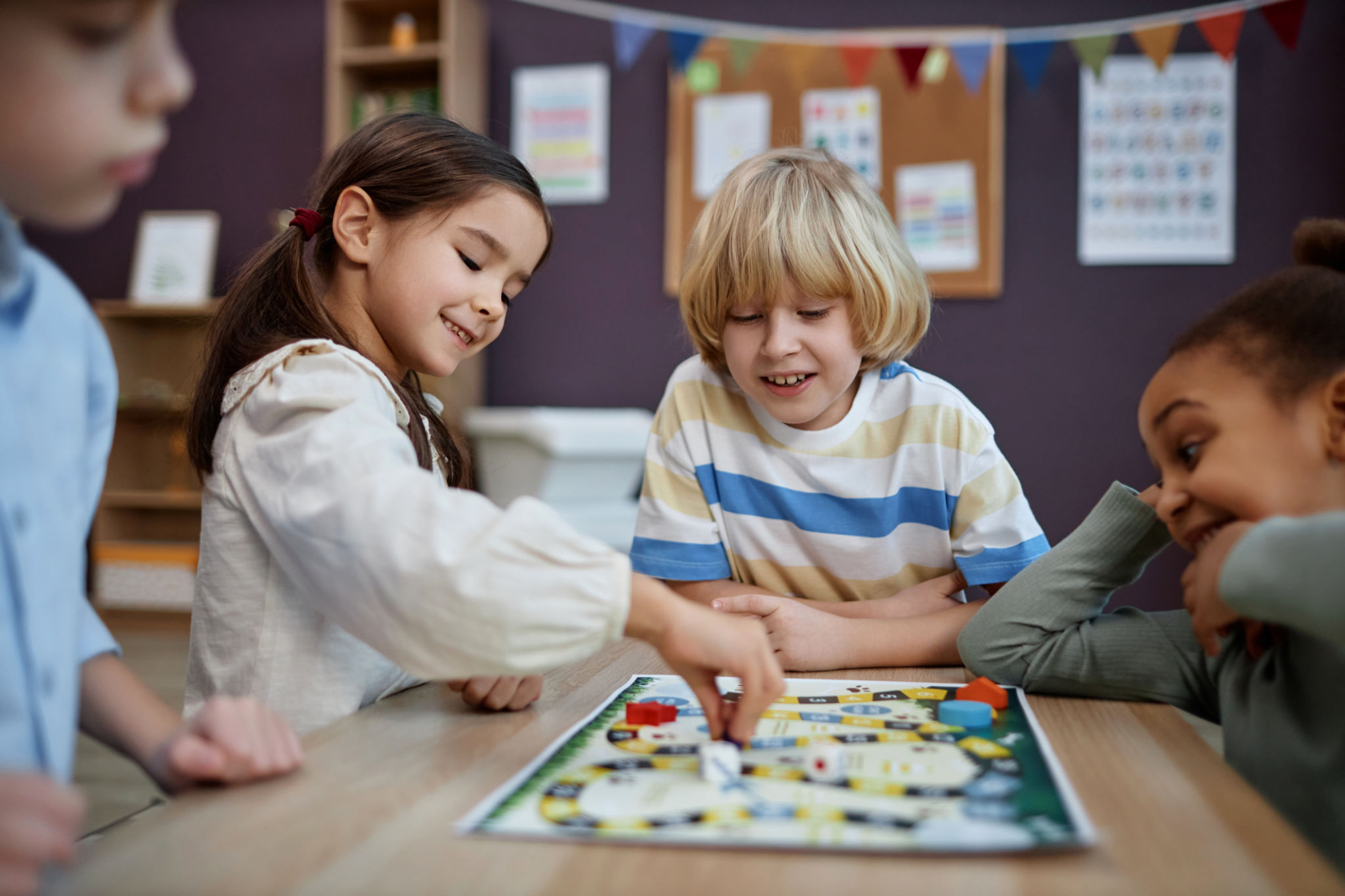 children playing board games