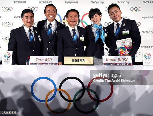 Tokyo 2020 vice president Masato Mizuno, Japanese deputy prime minister Taro Aso, Tokyo Governor Naoki Inose, TV presenter Christel Takigawa and...