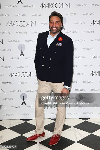 Mousse T attends the Marc Cain Photocall during the Mercedes-Benz Fashion Week Spring/Summer 2014 at the Hotel Adlon on July 4, 2013 in Berlin,...