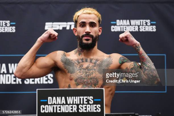 Ramon Taveras poses on the scale during the DWCS season seven, week ten weigh-in at Palace Station Hotel & Casino on October 9, 2023 in Las Vegas,...