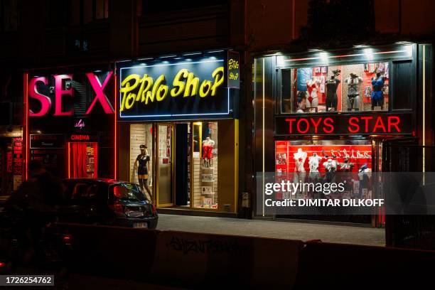 This photograph taken in Paris on October 11 shows sex shops near Place Pigalle at night.