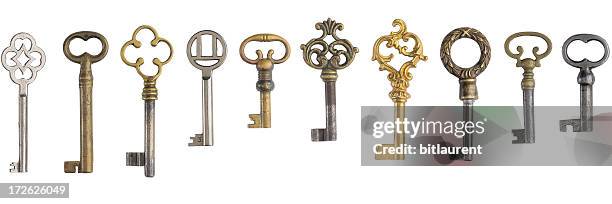 ten keys on white background - old fashioned key stock pictures, royalty-free photos & images