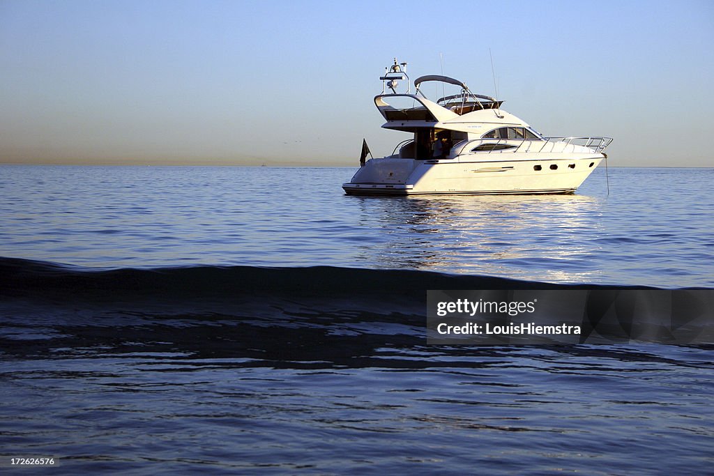 Yacht and wave