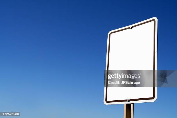 blank sign against the clear blue sky - blank-sign-post stock pictures, royalty-free photos & images