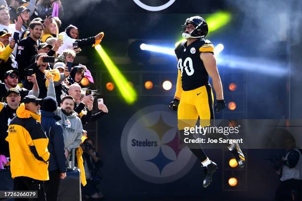 Watt of the Pittsburgh Steelers jumps in the air while taking the field prior to a game against the Baltimore Ravens at Acrisure Stadium on October...