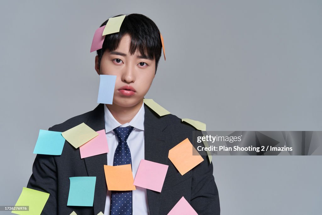 Male, stress, burnout syndrome, post-it note, sigh