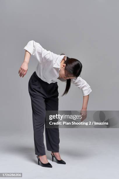 behavior, gaslighting, gestures, manipulation, puppetry, control - bend over stock pictures, royalty-free photos & images