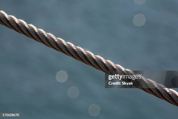 shiney steel cable - wire rope stock pictures, royalty-free photos & images