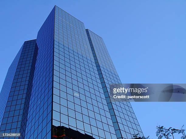 blue glass buildings - blue glass stock pictures, royalty-free photos & images