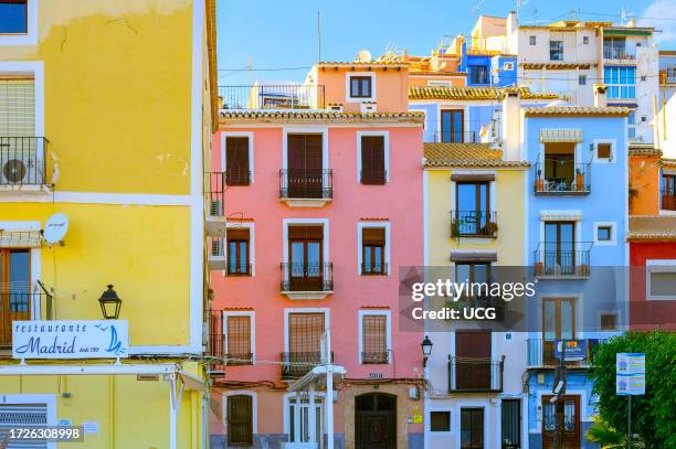 Villajoyosa, Spain, Architecture and building facades in the waterfront district. The houses are painted in pastel colors. The area is a famous...