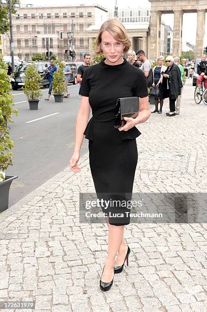 Kamilla Baar attends the Marc Cain Show during the Mercedes-Benz Fashion Week Spring/Summer 2014 at Brandenburg Gate on July 4, 2013 in Berlin,...