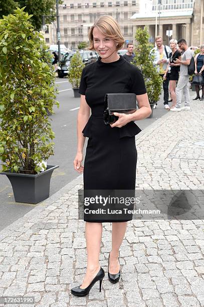 Kamilla Baar attends the Marc Cain Show during the Mercedes-Benz Fashion Week Spring/Summer 2014 at Brandenburg Gate on July 4, 2013 in Berlin,...
