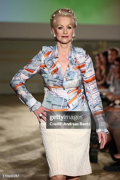 Marika Kilius walks the runway at the Sava Nald Show during the Mercedes-Benz Fashion Week Spring/Summer 2014 at Hotel Adlon on July 4, 2013 in...