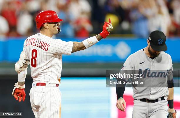 Nick Castellanos of the Philadelphia Phillies gestures after hitting a double during the fourth inning against the Miami Marlins in Game One of the...