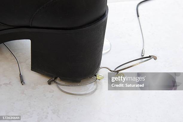 stepped on eyeglasses - stappen stockfoto's en -beelden
