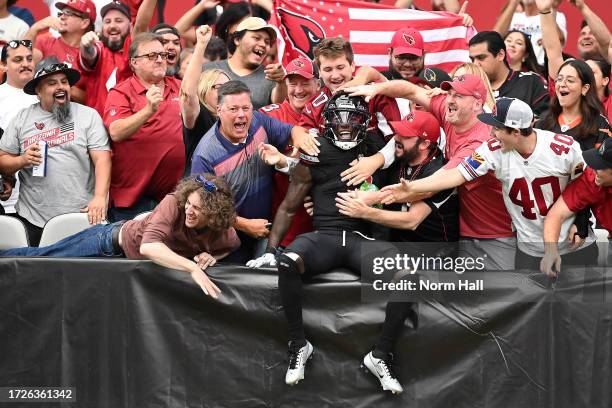 Marquise Brown of the Arizona Cardinals celebrates after catching a touchdown pass against the Cincinnati Bengals during the second quarter at State...