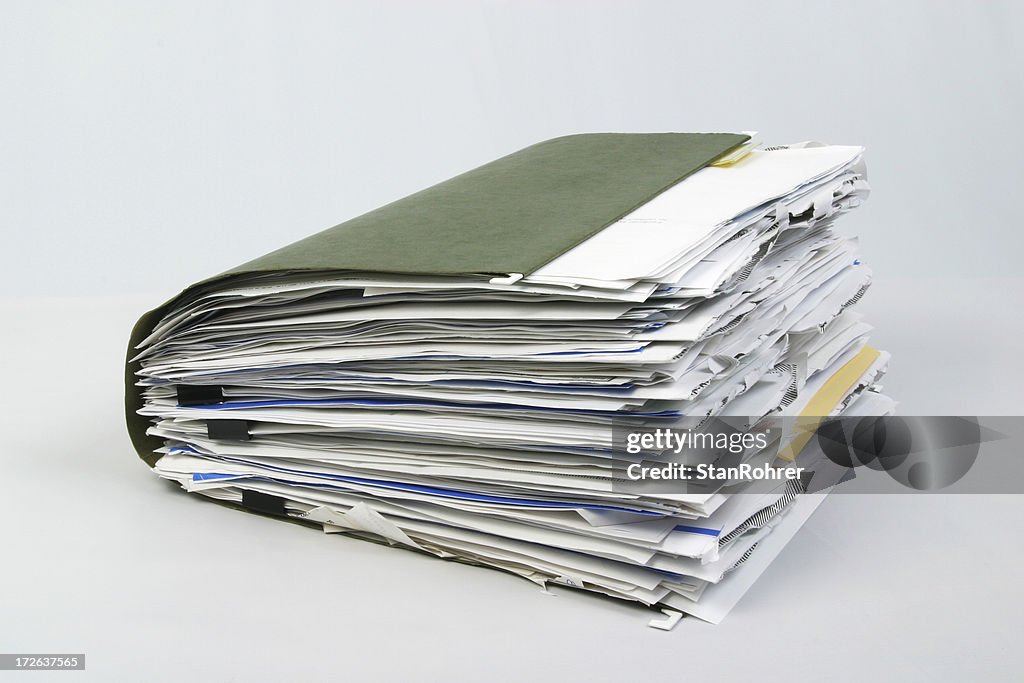 Overstuffed File Folder 3 High-Res Stock Photo - Getty Images