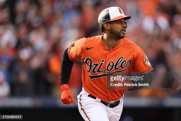 Aaron Hicks of the Baltimore Orioles runs to first base against the Texas Rangers during Game Two of the American League Division Series at Oriole...