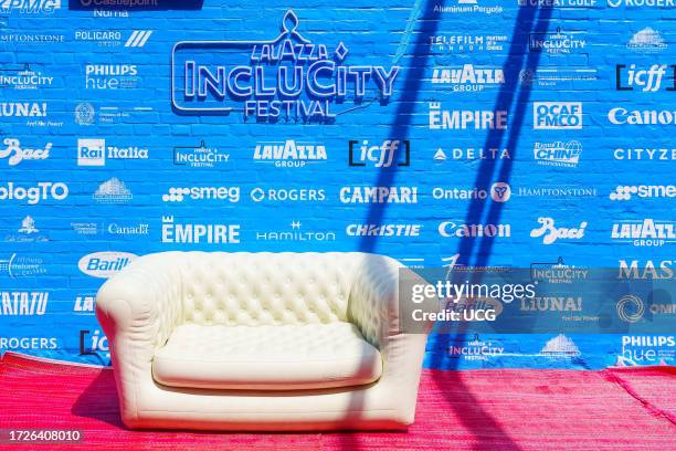 Toronto, Canada, Distillery District. Lavazza Inclucity Festival. Inflatable furniture for selfies and interviews. Brands of sponsors in the...