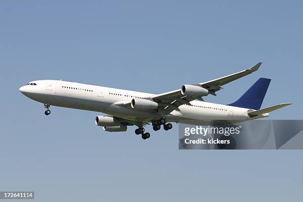 approaching runway. - airplane side view stock pictures, royalty-free photos & images