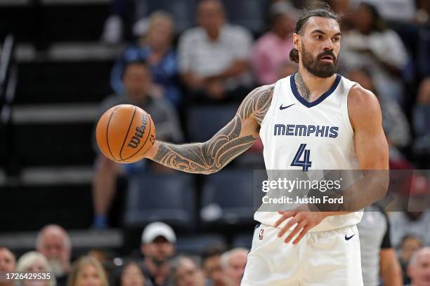 Steven Adams of the Memphis Grizzlies handles the ball during the game \P at FedExForum on October 08, 2023 in Memphis, Tennessee. NOTE TO USER: User...