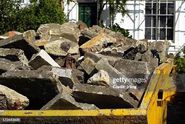 yellow builders rubbish skip - strip stock pictures, royalty-free photos & images